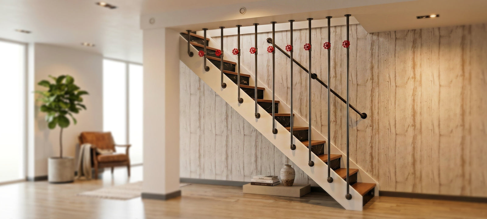 Garde-corps d'escalier industriel en tuyaux acier noir et raccords fonte noire avec volants rouges décoratifs