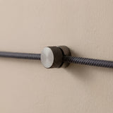 Metalen wandkabelhouder voor strijkijzersnoer — Zwarte parel
