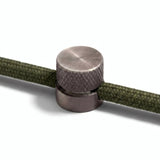 Metalen wandkabelhouder voor strijkijzersnoer